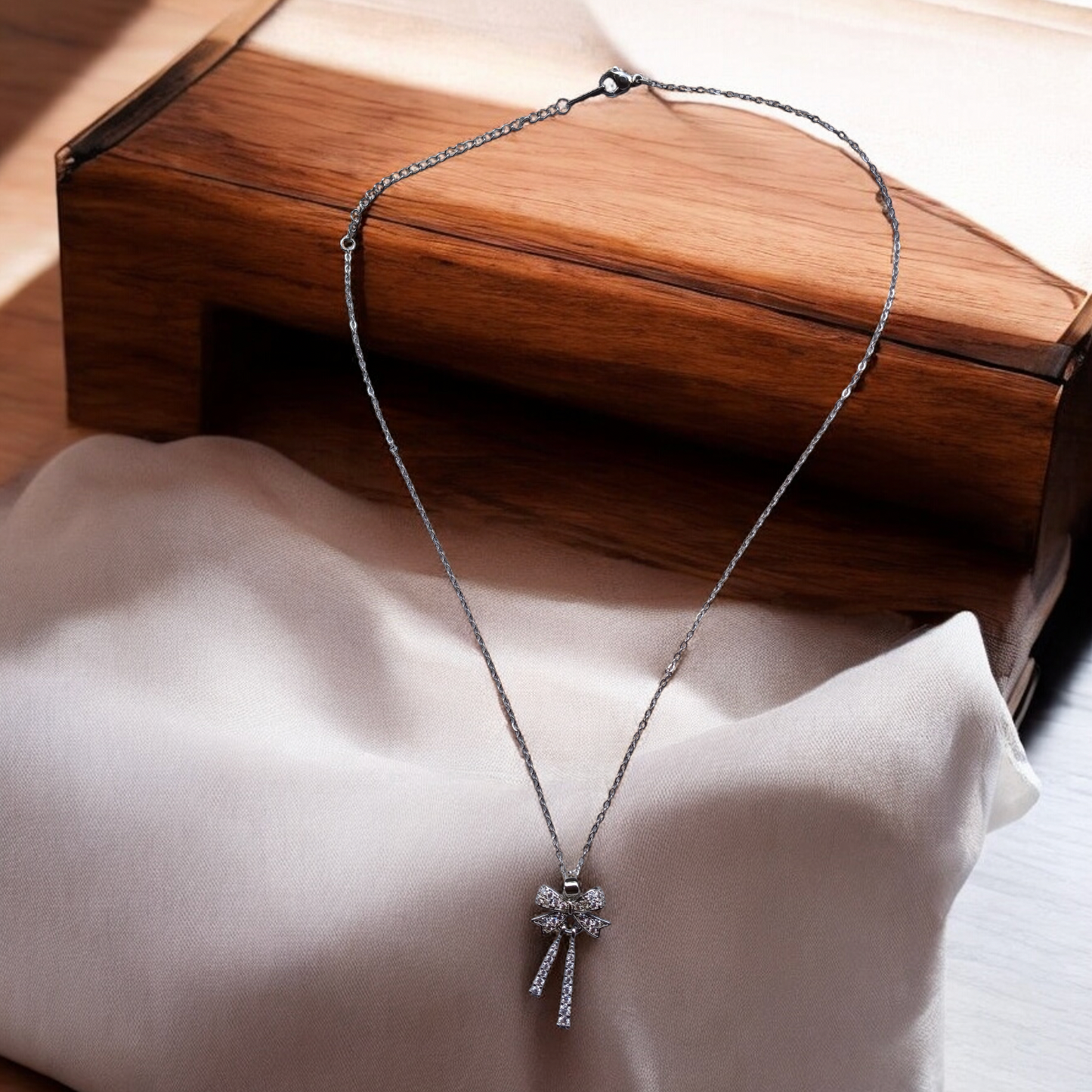 Elegant Bow Silver Pendant